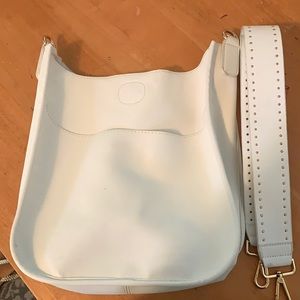 Ah-dorned crossbody bag